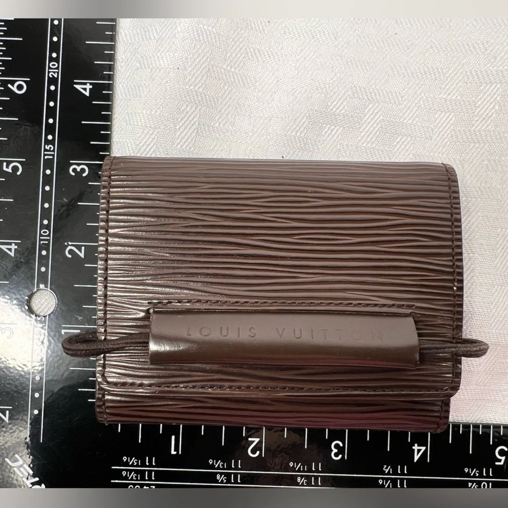 1083: Louis Vuitton Vintage Brown Epi Leather Compact Wallet